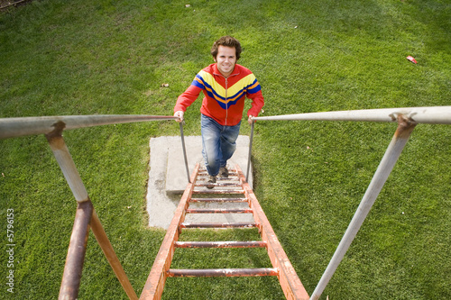 men climbing up the stairs in a park