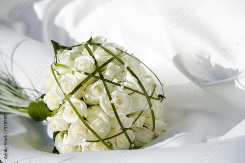 bouquet on a white dress