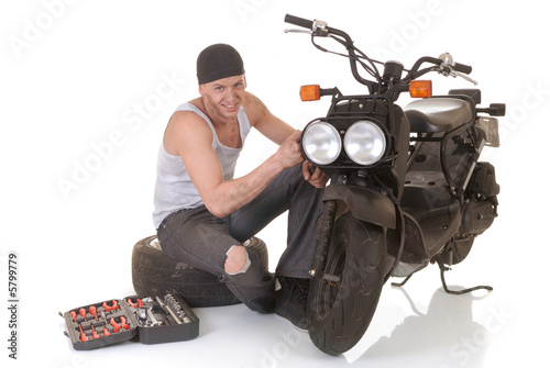 Handsome young male motorcycle mechanic, 