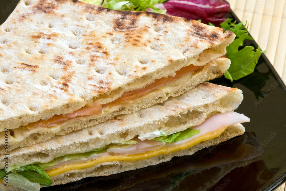 healthy smoked salmon and vegetables big sandwich with salad healthy smoked salmon and vegetables big sandwich with salad