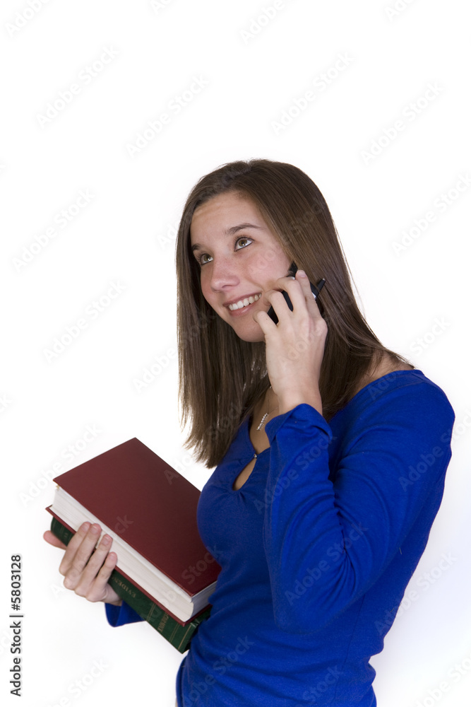 College student talks on the cellphone while gazing upward College student talks on the cellphone while gazing upward