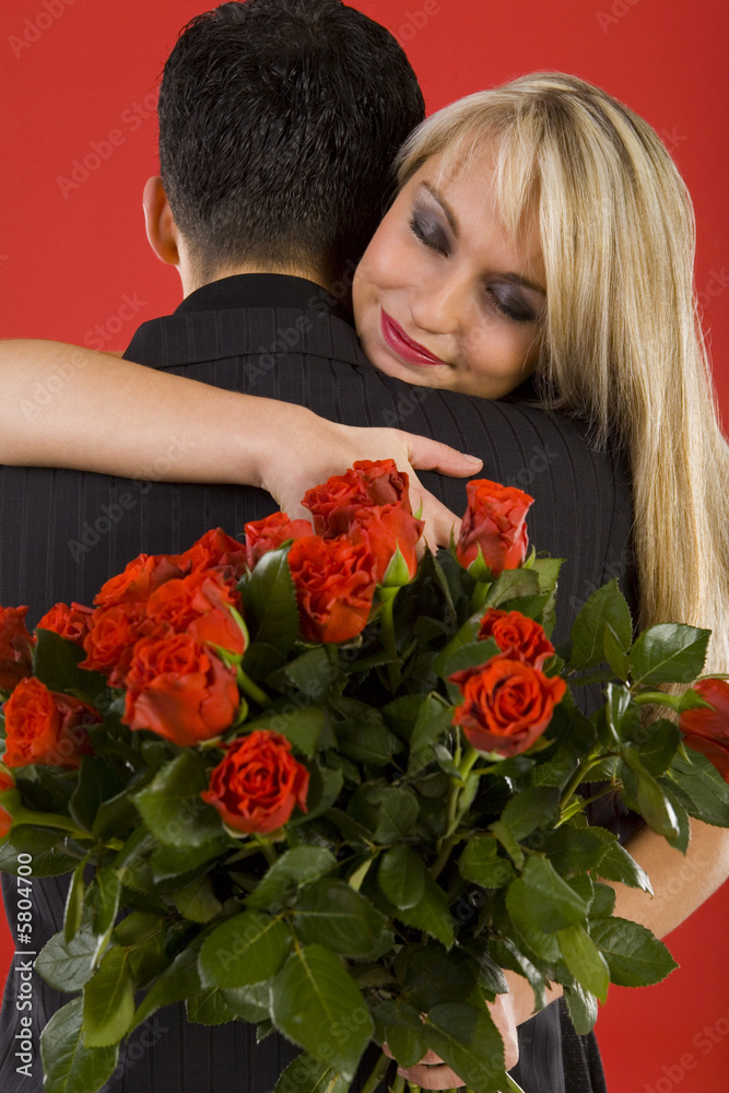 Young couple in happy hug. Young couple in happy hug.