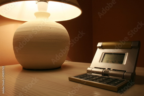 table lamp and a travel clock photo