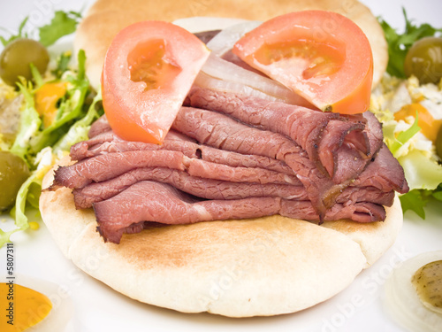 Sandwich of roastbeef with salad. photo