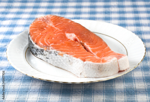 fresh salmon steak on a plate