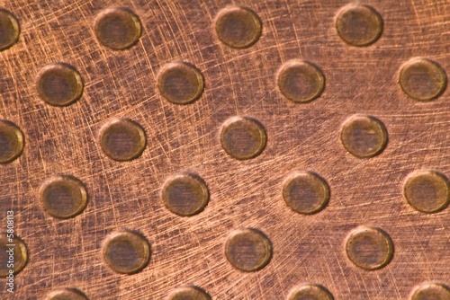 Punched Copper Metal Background