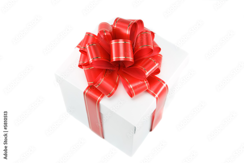 Fototapeta premium Gift box with the beautiful bow of red ribbon.