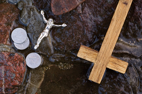 фотографія Cross, coins and Jesus figure.