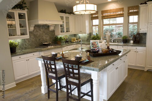 Modern Kitchen with a hardwood floor.