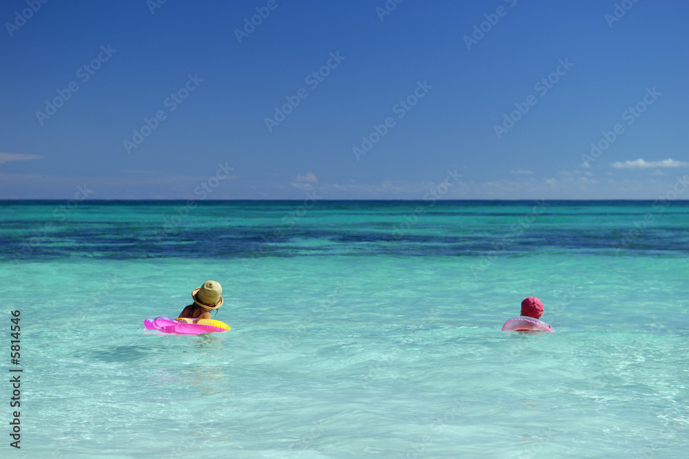 Children playing in sea