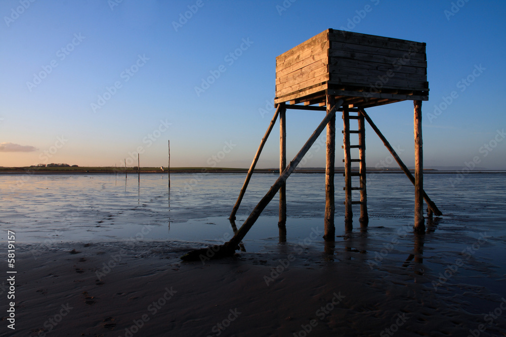 The wooden walking refuge hut  on Holy Island's causeway