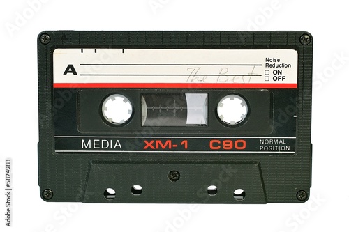 Old audio cassette isolated on white background