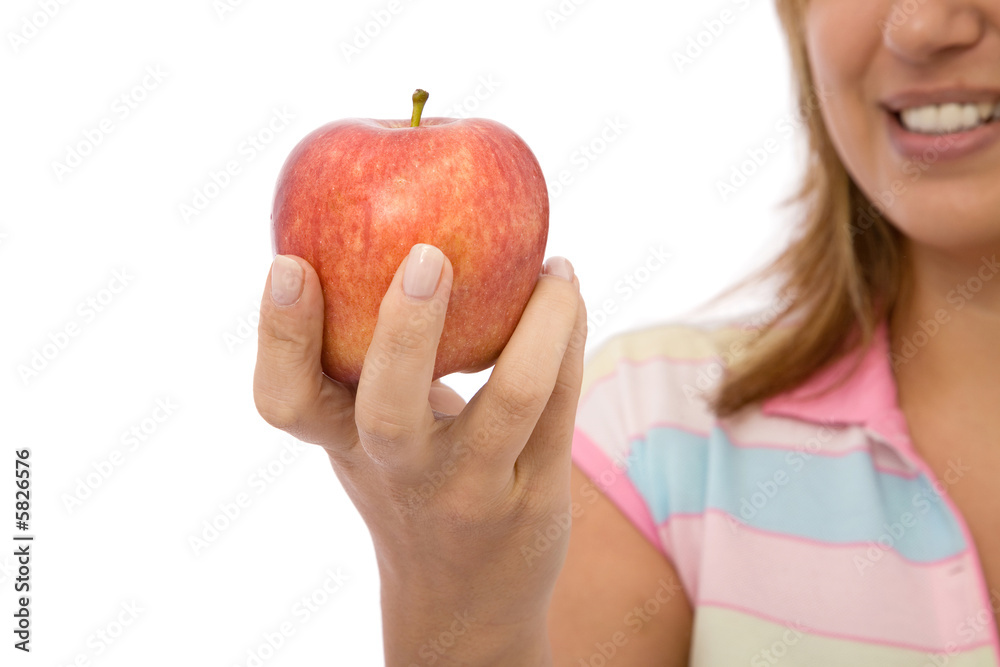 girl holding a fresh apple with a smile girl holding a fresh apple with a smile