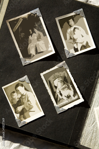 Photo Album with old stained photos