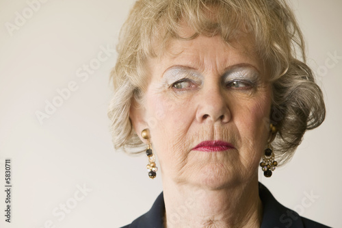 Close-up of a senior woman looking off to the left.