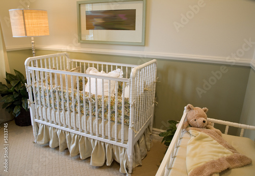 Fototapeta Naklejka Na Ścianę i Meble -  Baby bedroom with a crib, toys and decor.