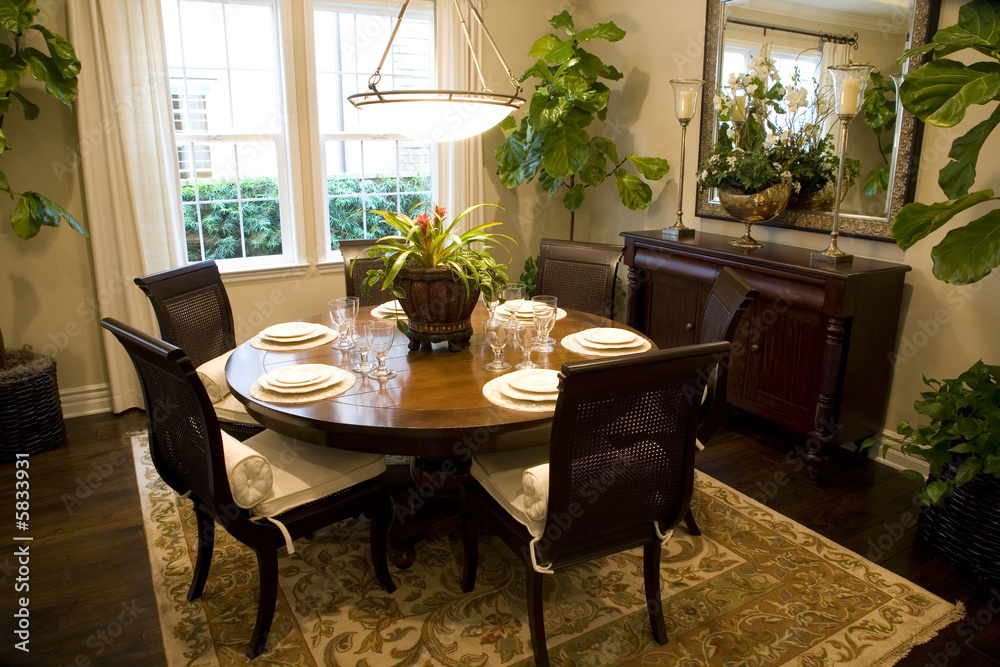 Dining room and table with luxurious decor.