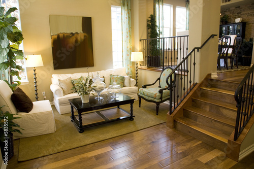 Living room and hardwood floor hallway.