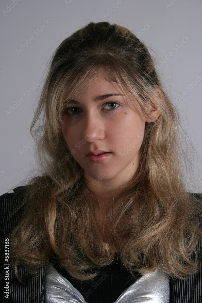 Pretty blond woman looking at camera