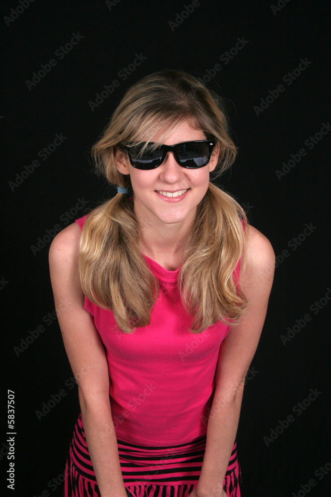 Girl in Sunglasses leaning forward Girl in Sunglasses leaning forward