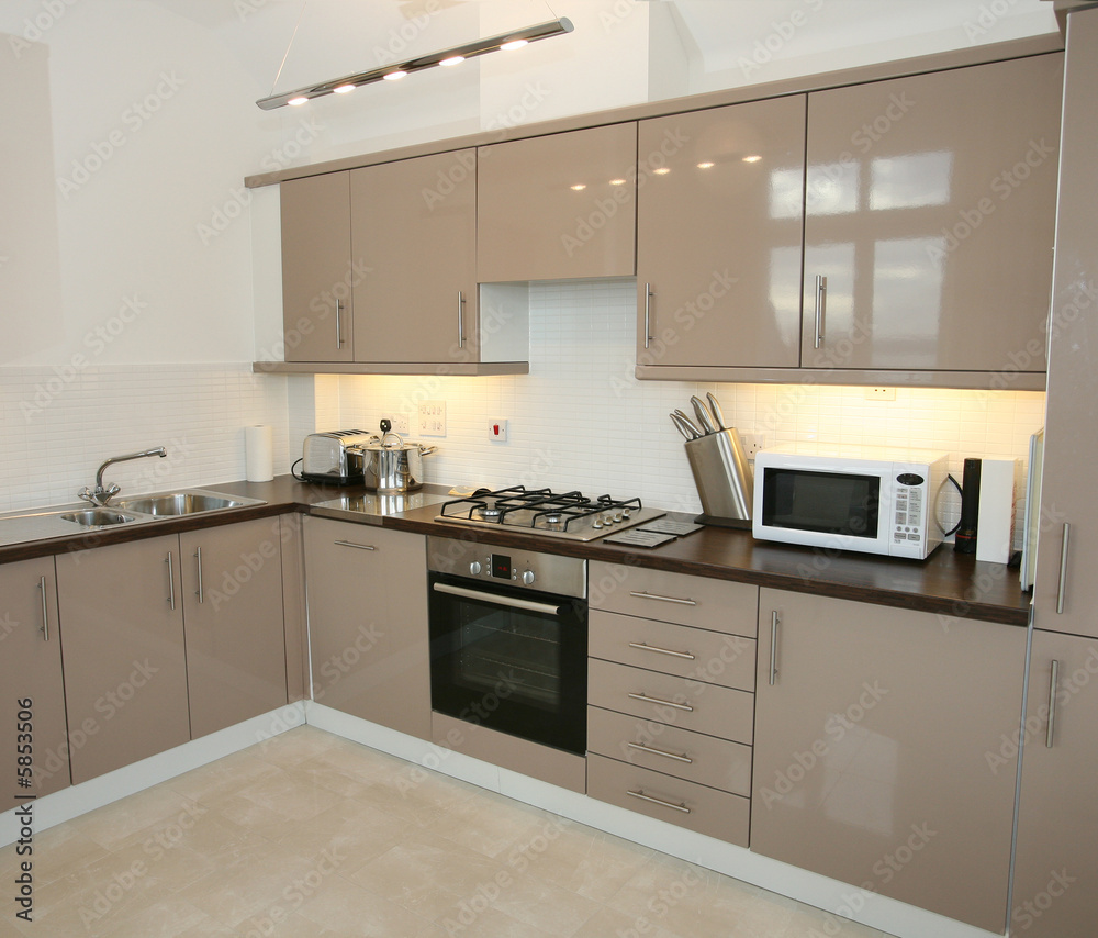 Modern kitchen interior with integrated appliances Modern kitchen interior with integrated appliances