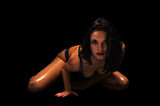 sexual brunette isolated on black background