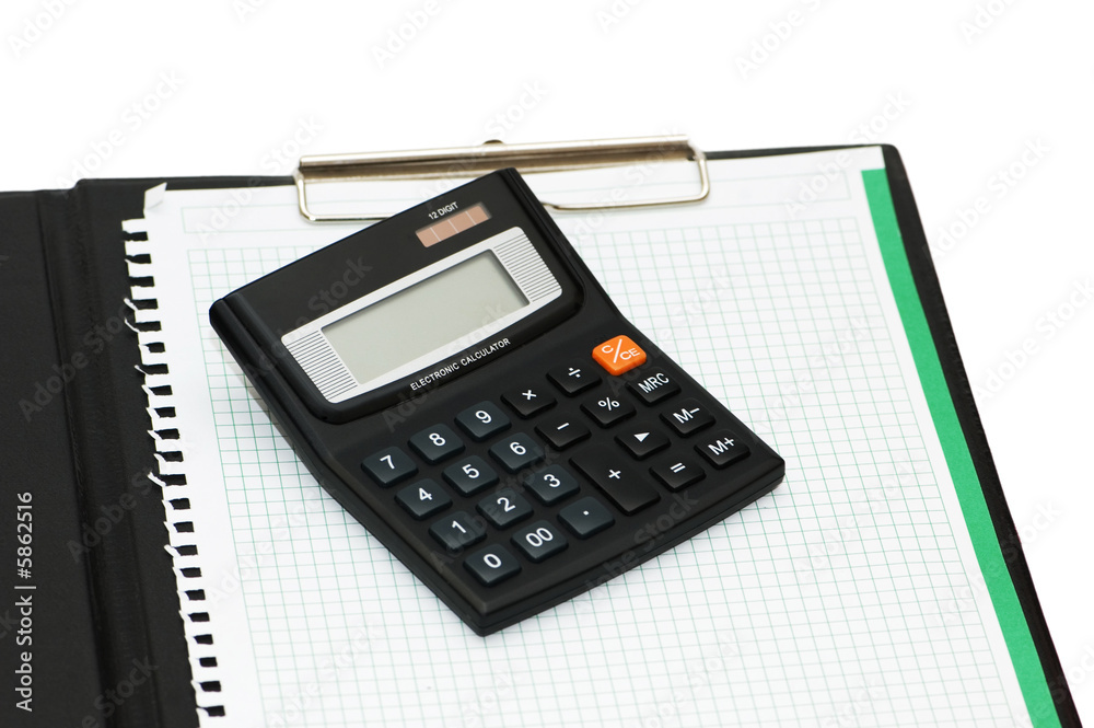 Calculator and binder isolated on the white Calculator and binder isolated on the white