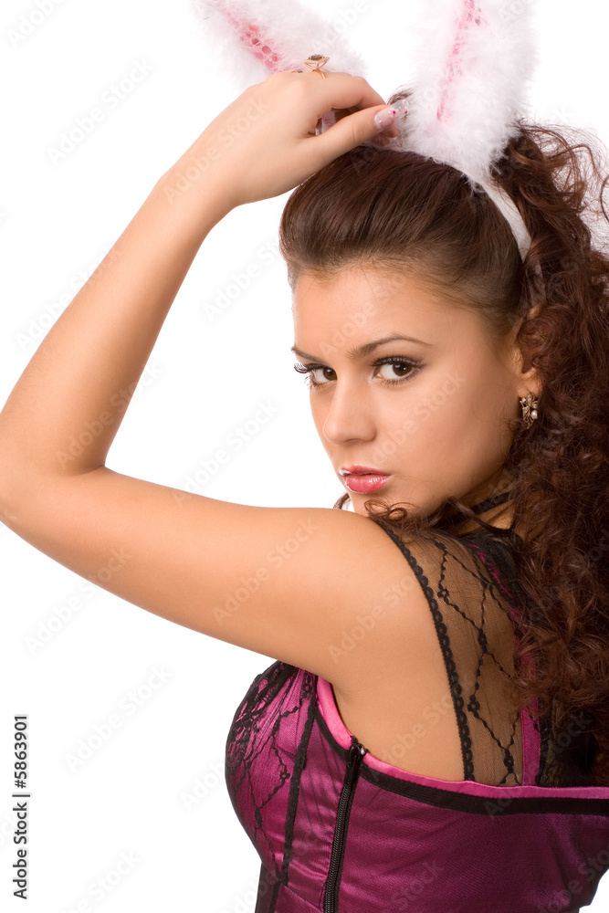 Obraz premium young woman dressed as sexy rabbit on white background