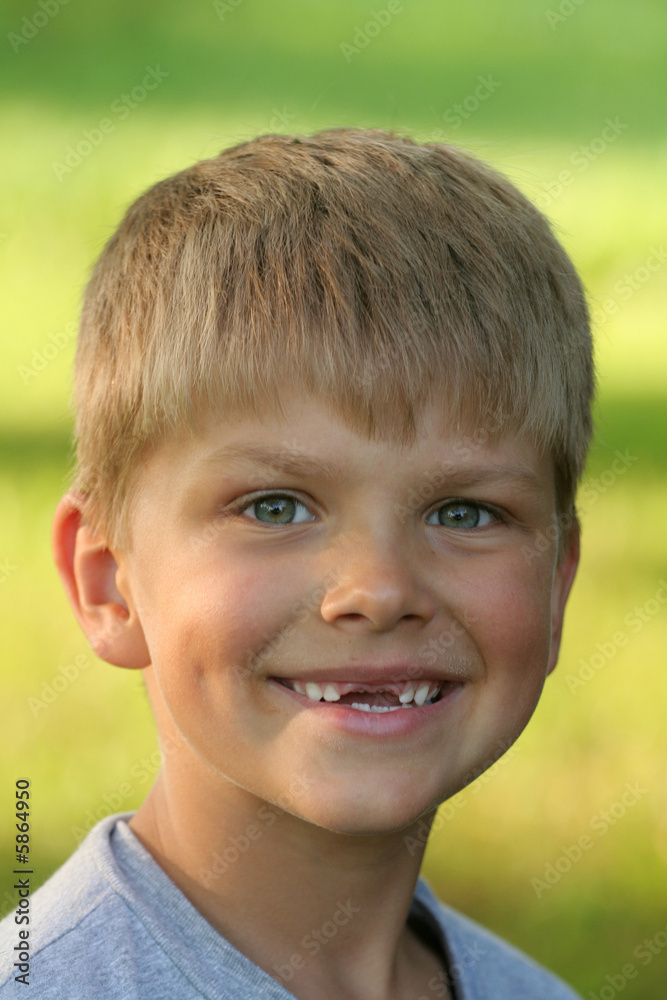 A portrait of a toothless child A portrait of a toothless child