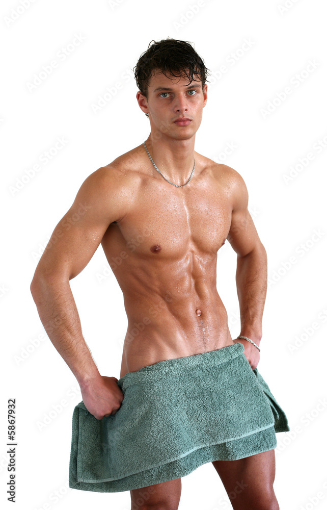 Wet muscular sexy man wrapped in towel isolated on white Wet muscular sexy man wrapped in towel isolated on white
