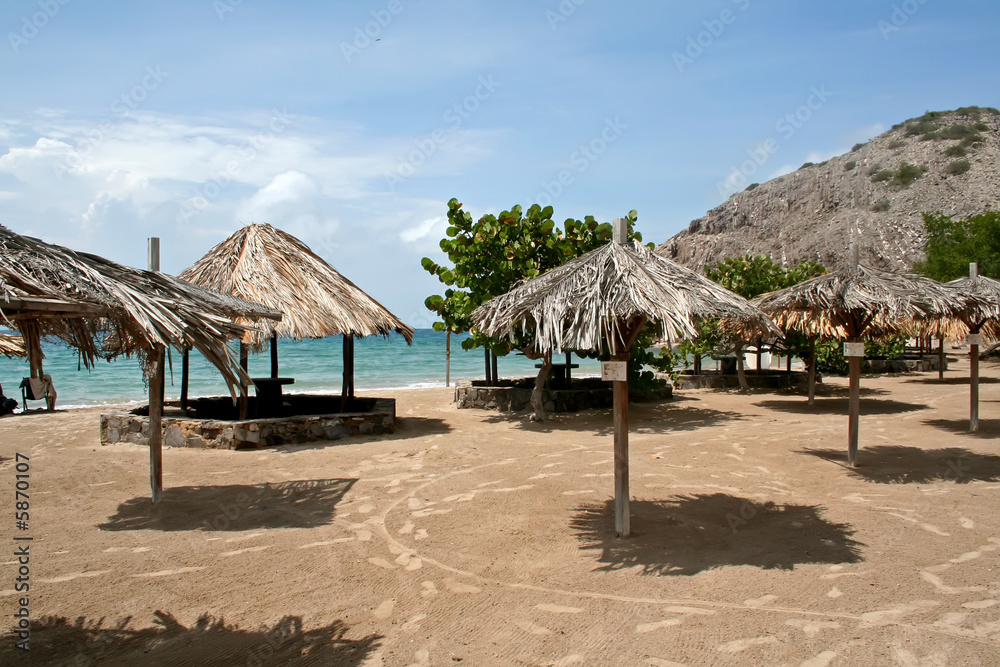 Seaside beach with shade umbrella on an island in Venezuela