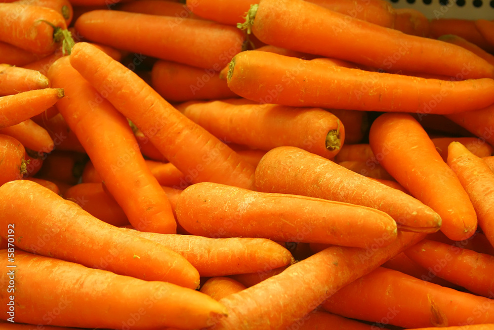 A tray of carrots in the market A tray of carrots in the market