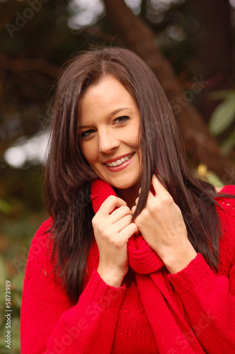 Young woman in red sweater