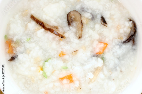 Chinese dimsum porridge with sliced mushrooms