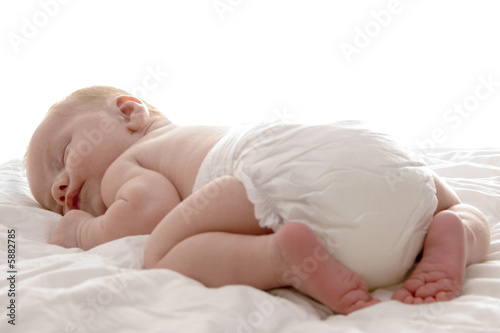 a sweet baby sleeping on a blanket