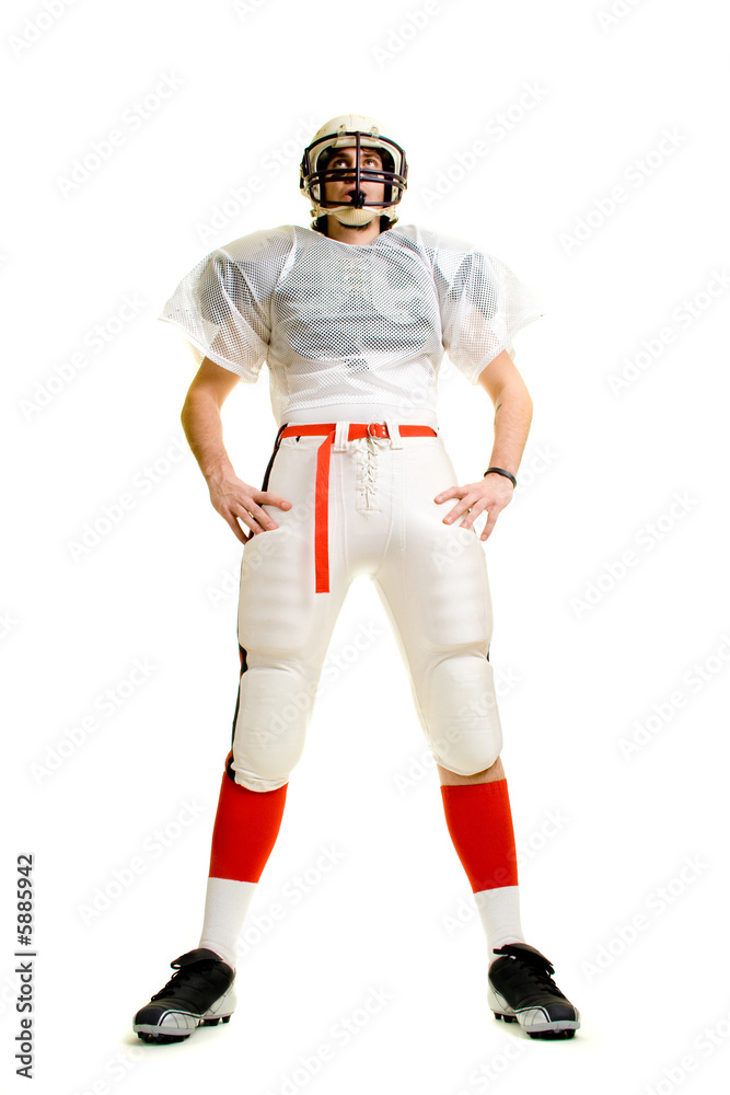 An American football player. Standing, low angle. An American football player. Standing, low angle.