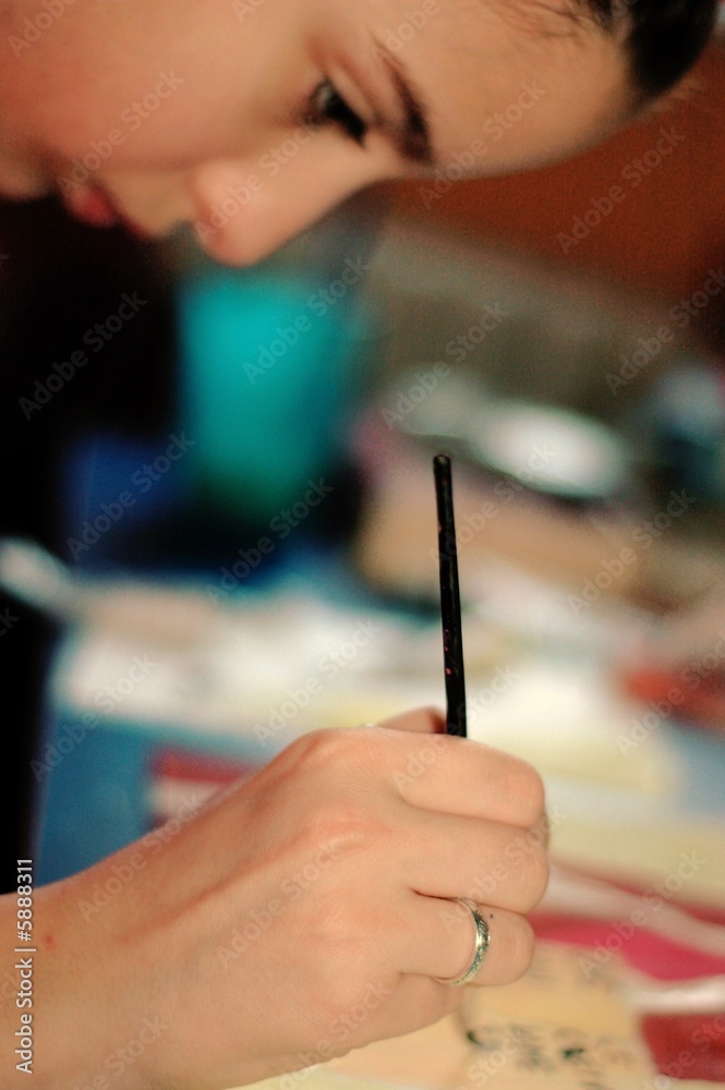 paintbrush and hand paintbrush and hand