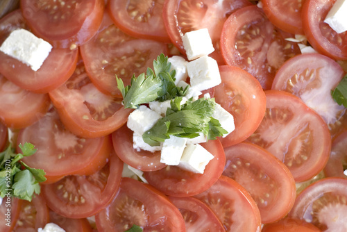 Light snack from tomatoes with soft cheese
