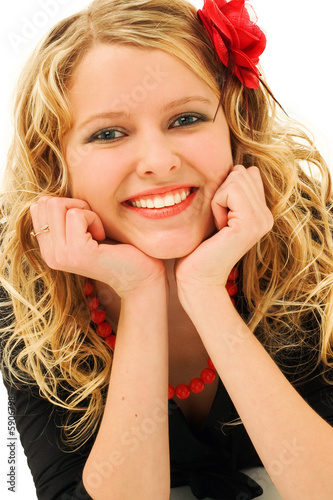 beauty blonde with red flower in hair isolated on white