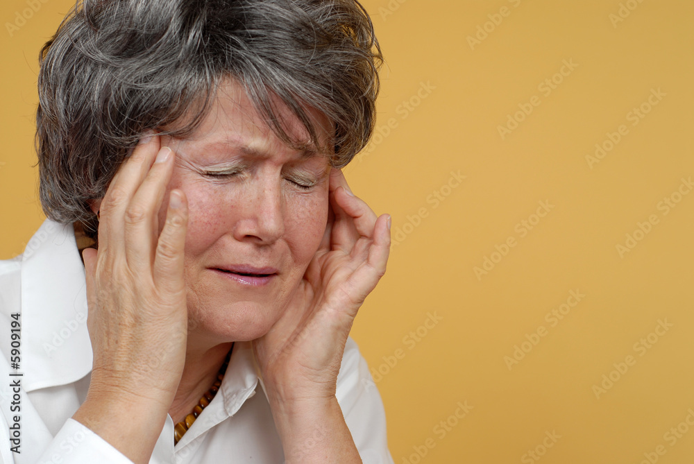 Painful headache portrait of an older woman Painful headache portrait of an older woman