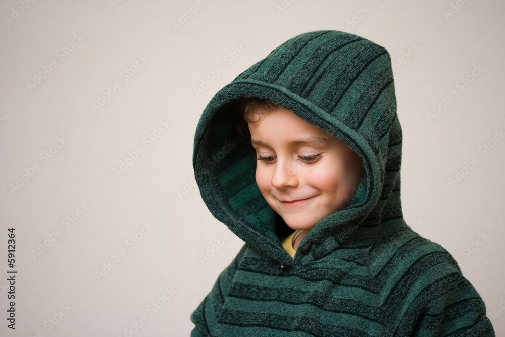 Portrait of a beautiful child wearing a green sweater Portrait of a beautiful child wearing a green sweater