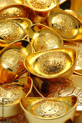 Close up of chinese gold ingot ornaments