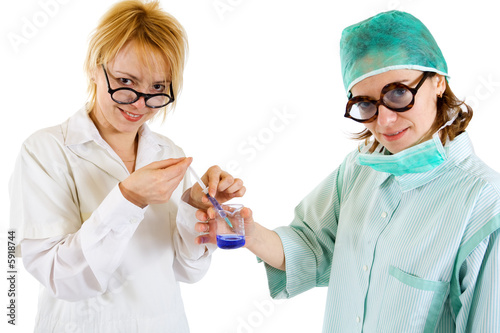Obraz na płótnie Two women preparing an injection