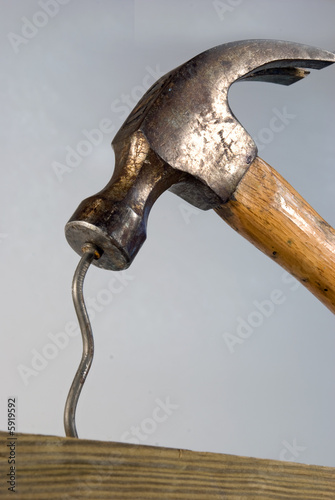Hammer and bent nail