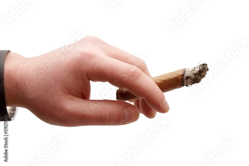 Hand holding a cigar smoking