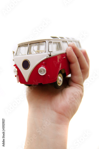 An old bus toy in hands