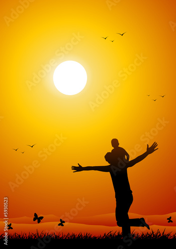 Father and child at sunset