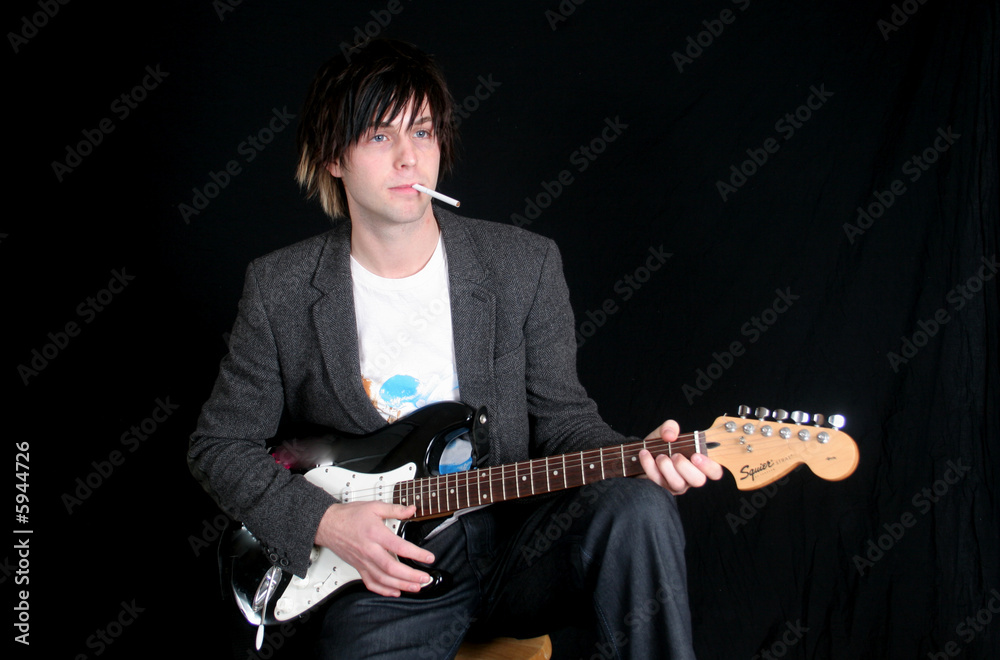 Obraz premium guitar player with cigarette