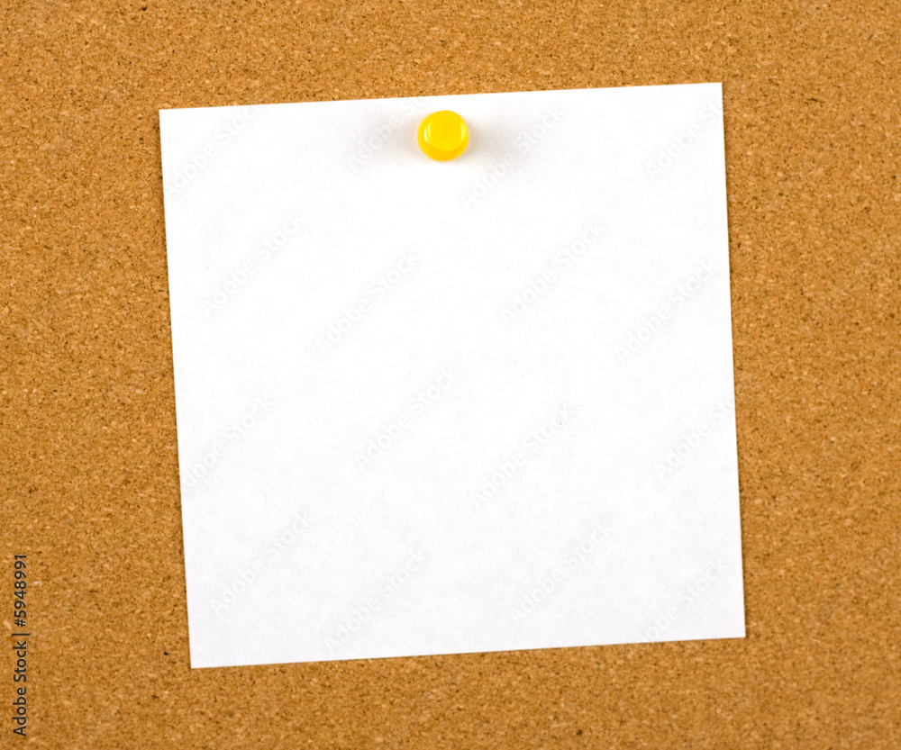 A blank note (for your message) pinned to a cork notice board A blank note (for your message) pinned to a cork notice board