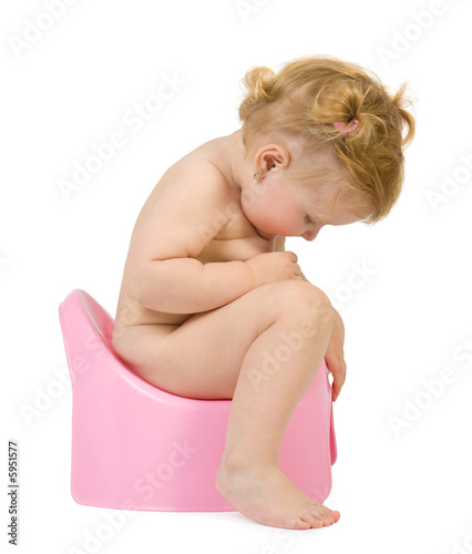 Pretty baby look in pink potty . Isolate on white